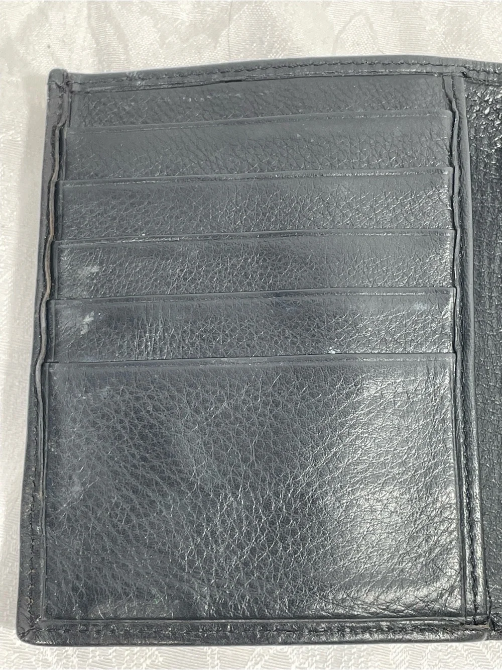 Brighton Vintage Tooled Leather Bifold Wallet in Black and Brown.